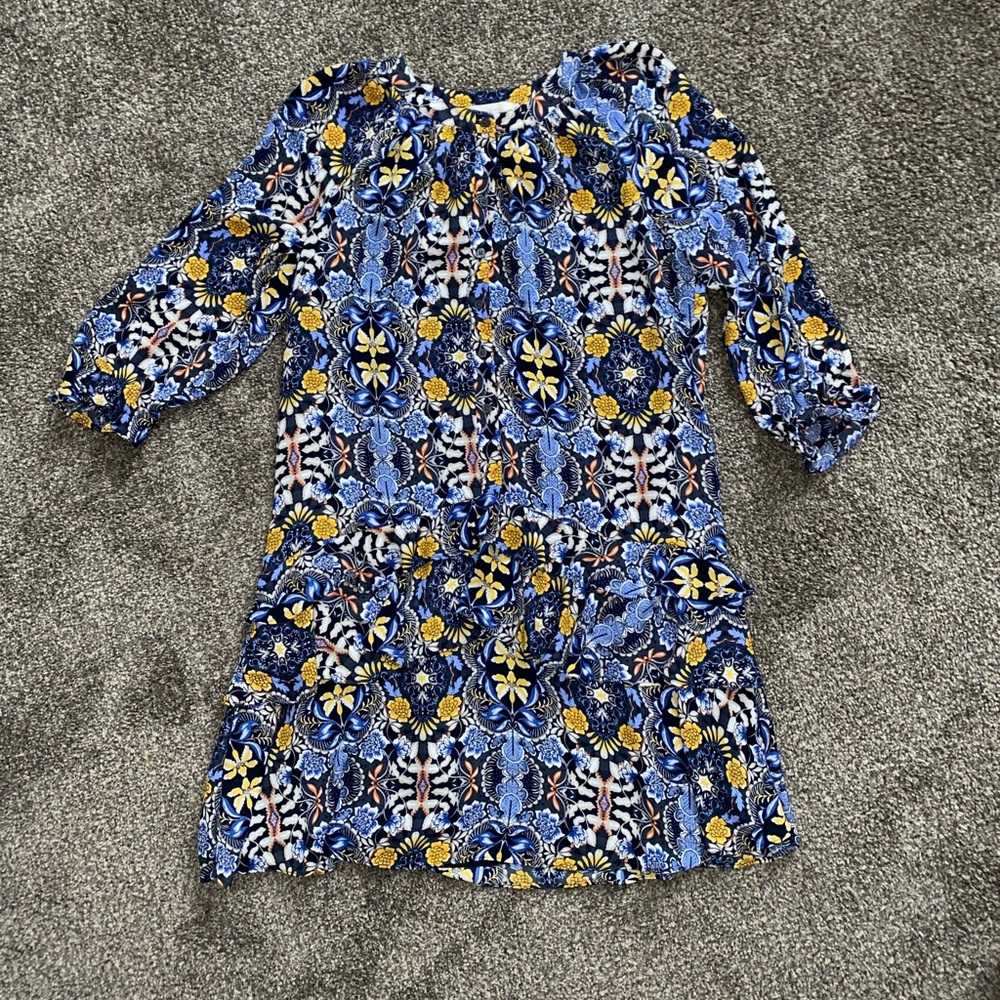 Loft brand, flowing mid thigh dress with lower ruffles and upper buttons.
